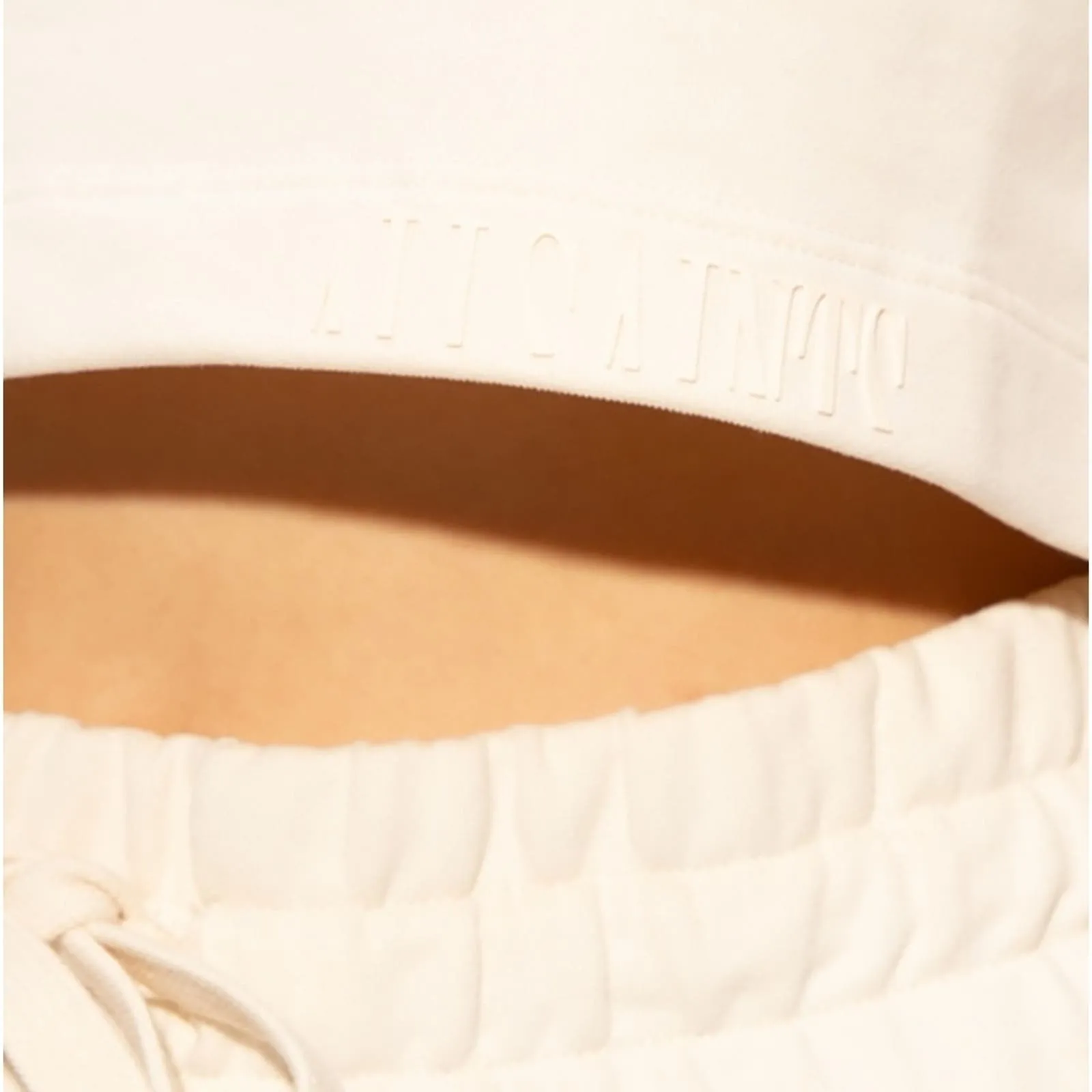 ALLSAINTS LILA CROP SLEEVELESS SWEATSHIRT TOP IN ECRU WHITE